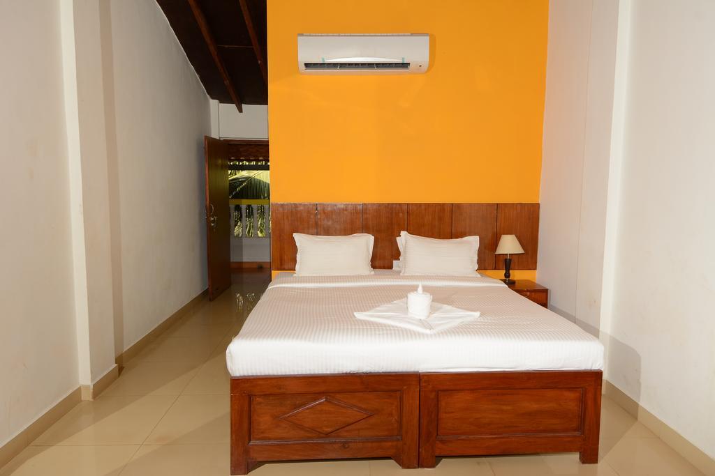 Silver Sands Sunshine - Angaara Candolim Phòng bức ảnh